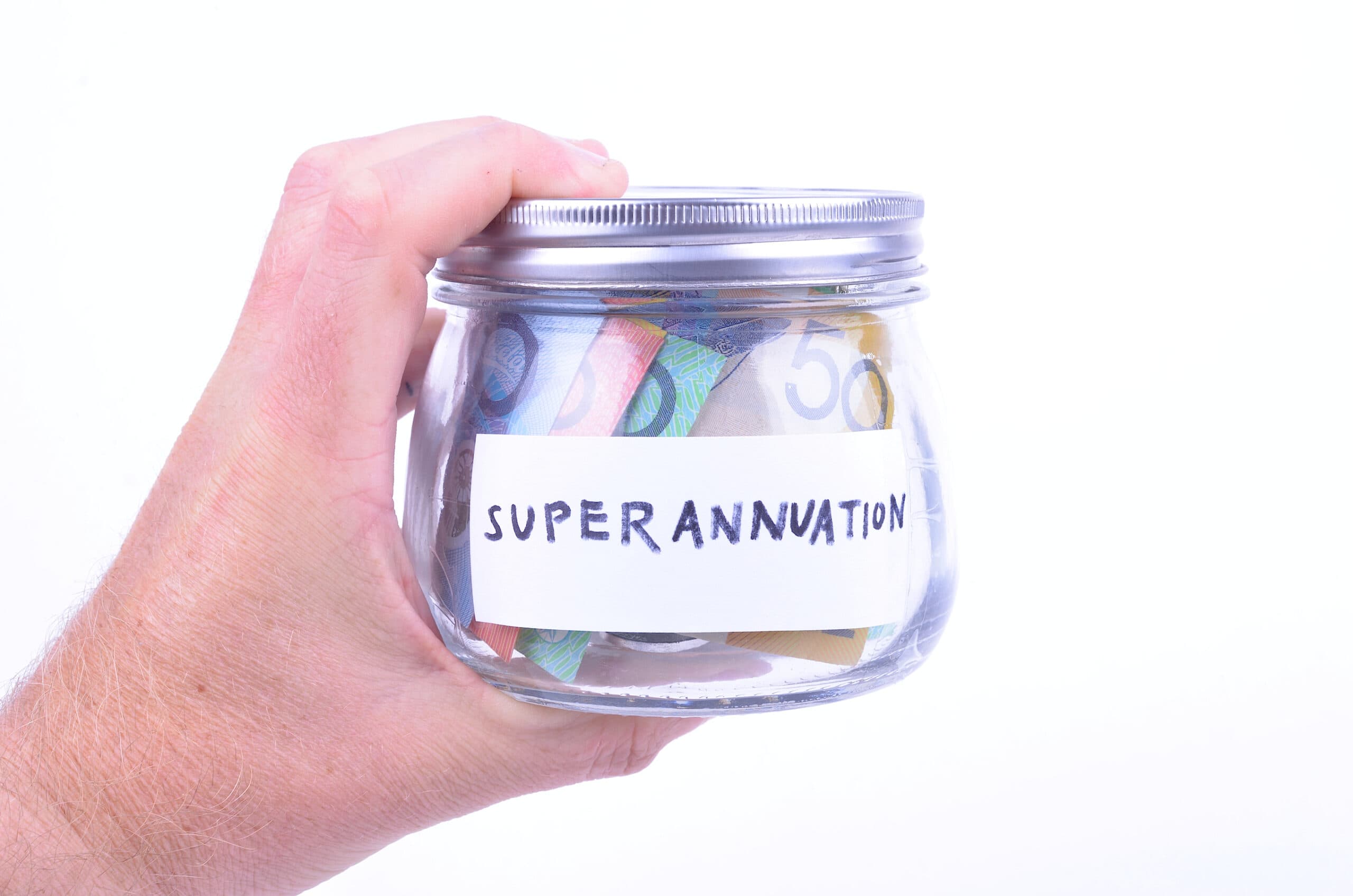 Man holding a jar of money filled with his superannuation savings